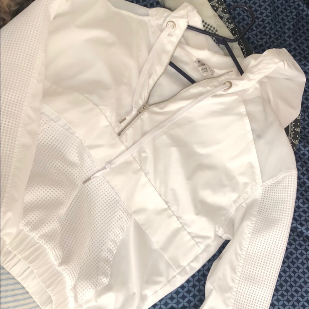 White windbreaker